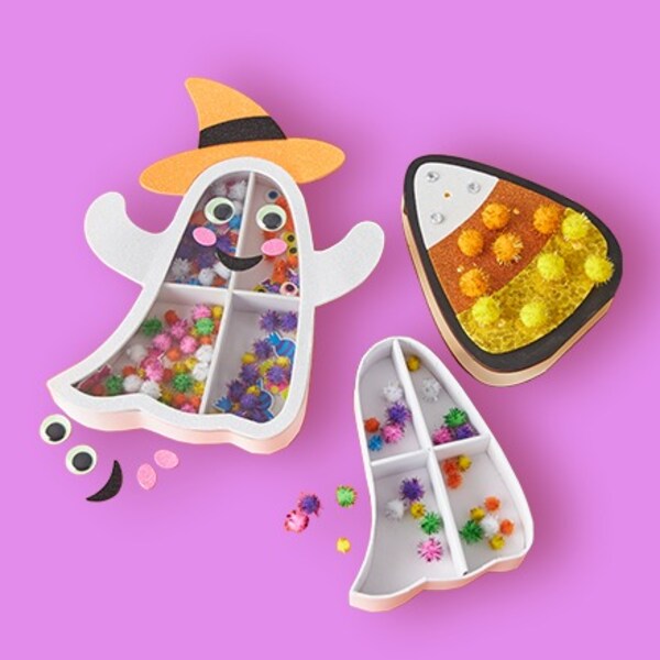 kids ghost and candy corn crafts on purple background